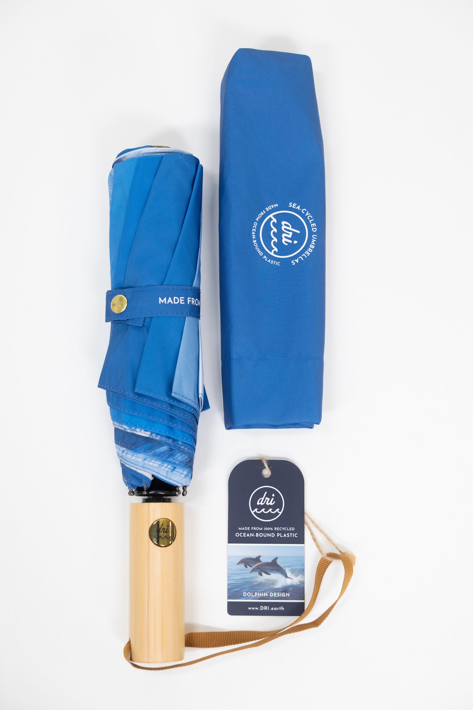 Blue umbrella with wooden handle and matching cover on a white background