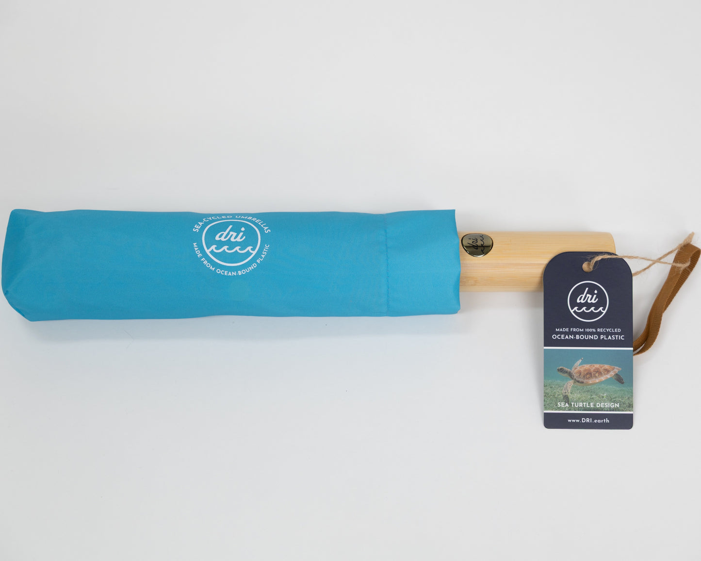 Blue umbrella with a matching sleeve and branded tag on a white background